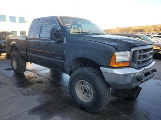 1FTNX21F0YEA47351 - 2000 FORD F250 SUPER DUTY BLACK photo 4