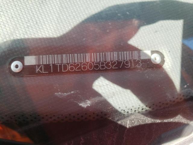 KL1TD62605B327913 - 2005 CHEVROLET AVEO BASE SILVER photo 12