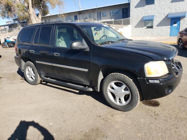 1GKDT13S572113554 - 2007 GMC ENVOY BLACK photo 4