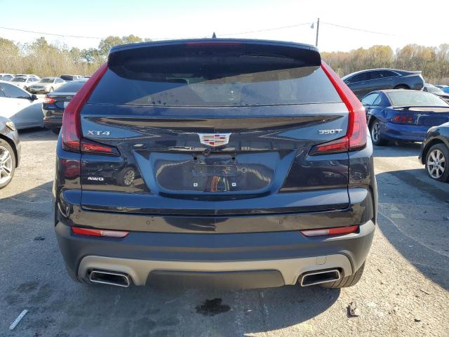 1GYFZDR49PF194607 - 2023 CADILLAC XT4 PREMIUM LUXURY BLACK photo 6