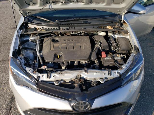 5YFBURHE5KP909409 - 2019 TOYOTA COROLLA L SILVER photo 11