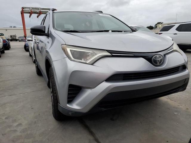 2T3ZFREV4HW349314 - 2017 TOYOTA RAV4 LE SILVER photo 5