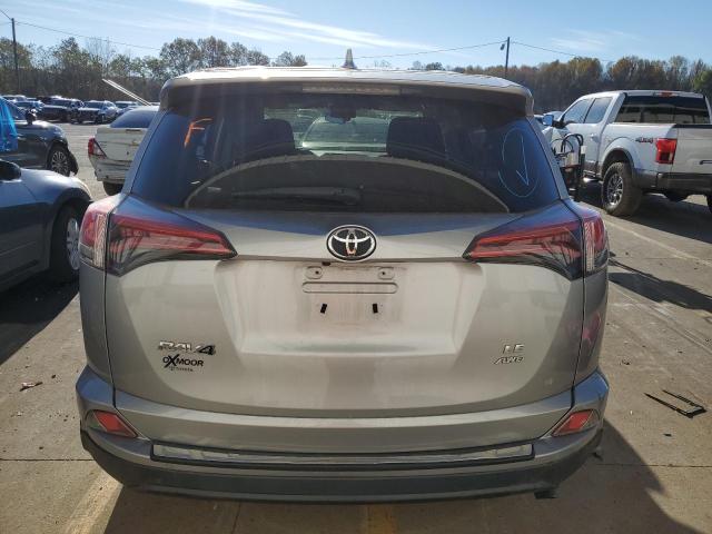 2T3BFREV8JW720241 - 2018 TOYOTA RAV4 LE SILVER photo 6