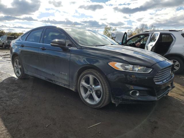 3FA6P0LU7ER388149 - 2014 FORD FUSION SE HYBRID BLACK photo 4