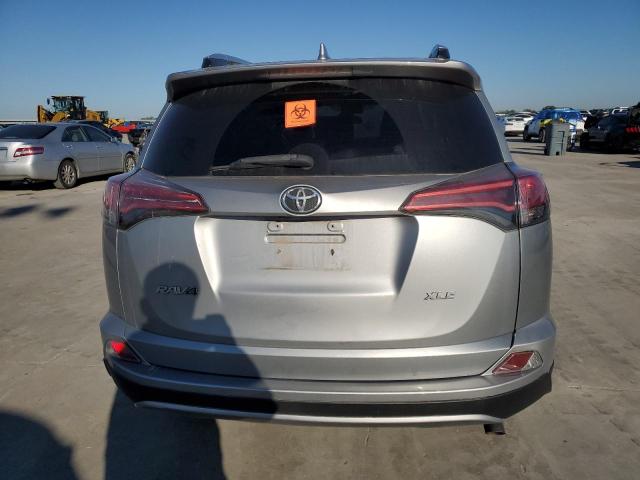 2T3WFREV0GW269090 - 2016 TOYOTA RAV4 XLE SILVER photo 6