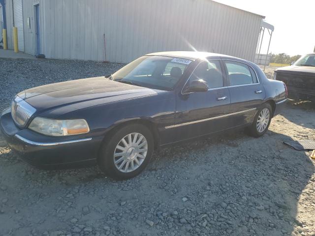 1LNHM83W74Y655765 - 2004 LINCOLN TOWN CAR ULTIMATE BLUE photo 1