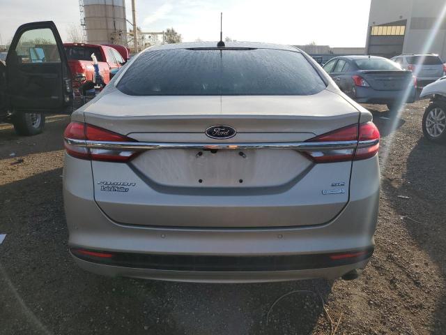 3FA6P0HD7JR267754 - 2018 FORD FUSION SE GOLD photo 6