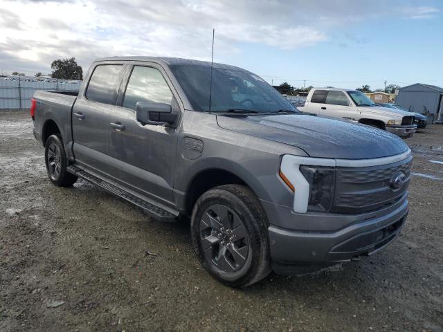 1FTVW1ELXNWG15480 - 2022 FORD F150 LIGHTNING PRO GRAY photo 4