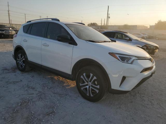 JTMZFREV3JJ171433 - 2018 TOYOTA RAV4 LE WHITE photo 4