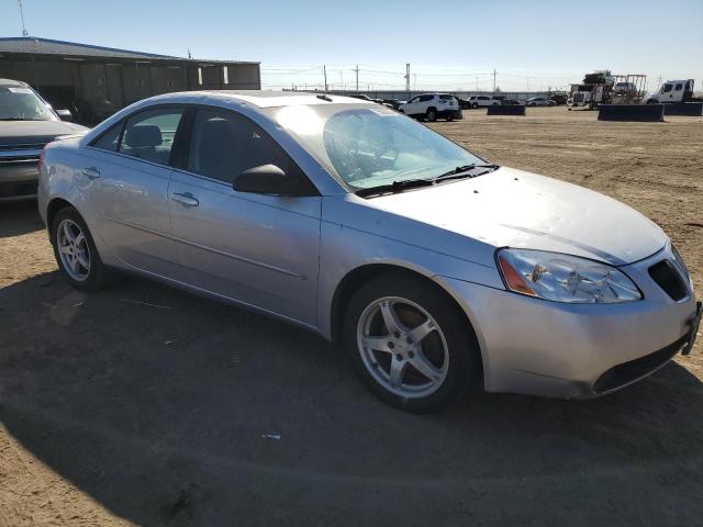 1G2ZG57N594217037 - 2009 PONTIAC G6 SILVER photo 4