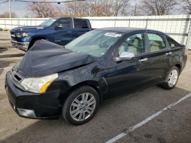 1FAHP3HN7AW194983 - 2010 FORD FOCUS SEL BLACK photo 1