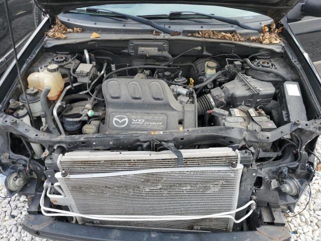 4F2CZ06164KM06152 - 2004 MAZDA TRIBUTE ES 黑色 照片 11