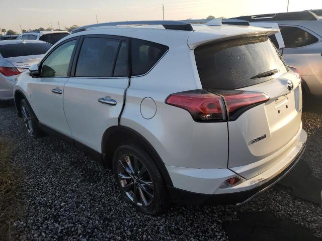 JTMYFREVXJJ168203 - 2018 TOYOTA RAV4 LIMITED WHITE photo 2