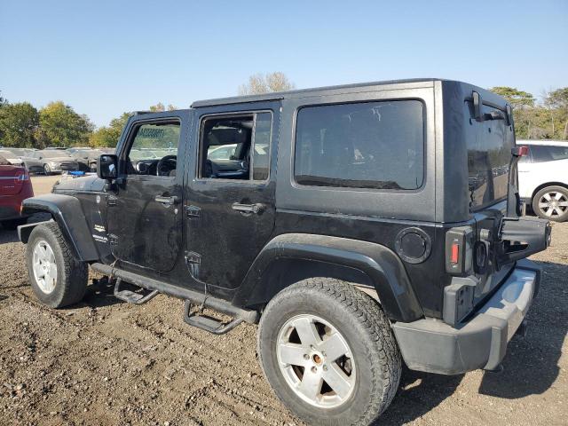 1J4BA5H10BL634002 - 2011 JEEP WRANGLER SAHARA BLACK photo 2