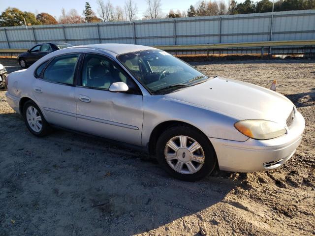 1FAFP56U95A306098 - 2005 FORD TAURUS SEL SILVER photo 4