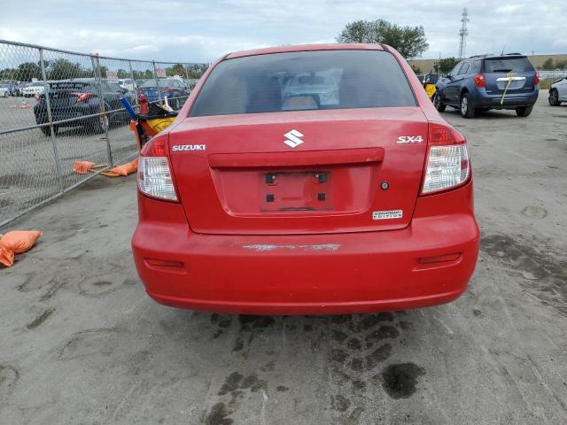 JS2YC5A25B6303675 - 2011 SUZUKI SX4 LE RED photo 6