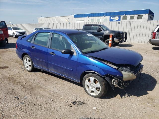 1FAFP34N75W152848 - 2005 FORD FOCUS ZX4 BLUE photo 4