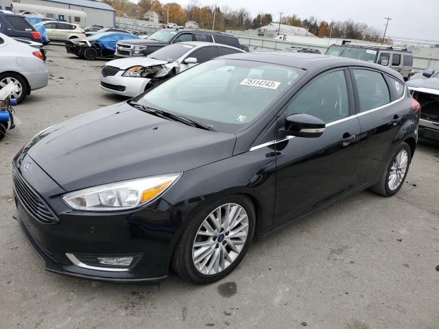 1FADP3N23HL333771 - 2017 FORD FOCUS TITANIUM BLACK photo 1