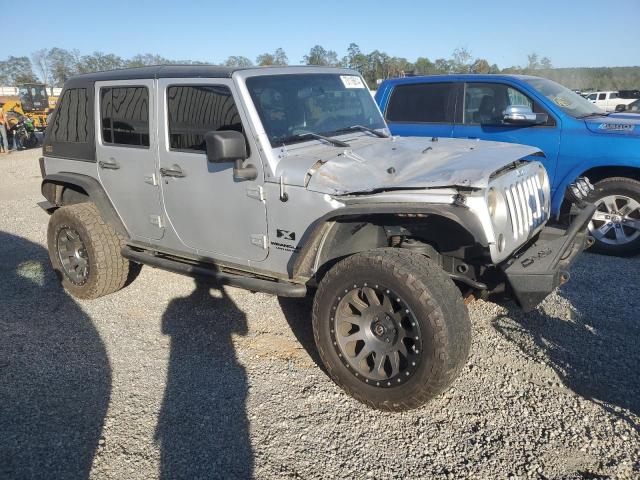 1J4GA39169L750341 - 2009 JEEP WRANGLER U X SILVER photo 4