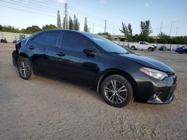 5YFBURHE4GP502317 - 2016 TOYOTA COROLLA L BLACK photo 4