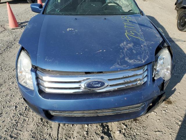 3FAHP07Z99R181735 - 2009 FORD FUSION SE BLUE photo 11