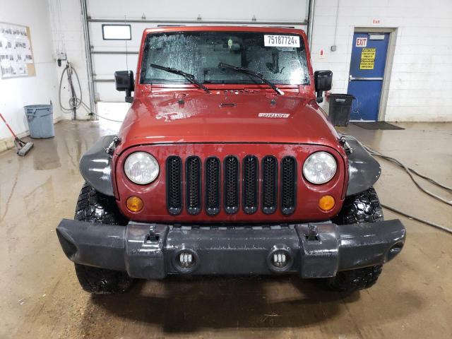 1J4GA591X9L708251 - 2009 JEEP WRANGLER U SAHARA RED photo 5