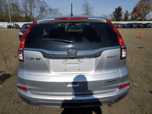 2HKRM4H41GH670938 - 2016 HONDA CR-V SE SILVER photo 6