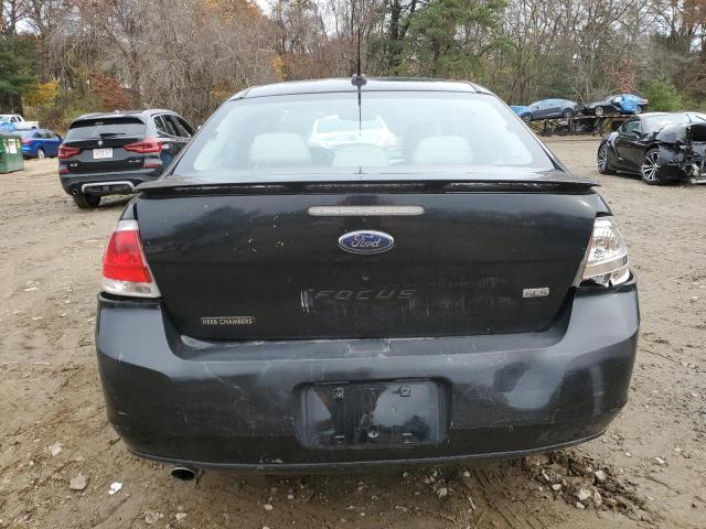 1FAHP36N89W145449 - 2009 FORD FOCUS SES BLACK photo 6