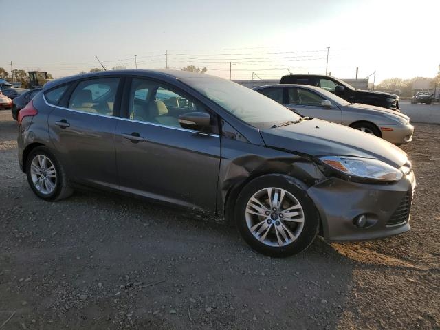 1FAHP3M21CL421052 - 2012 FORD FOCUS SEL GRAY photo 4