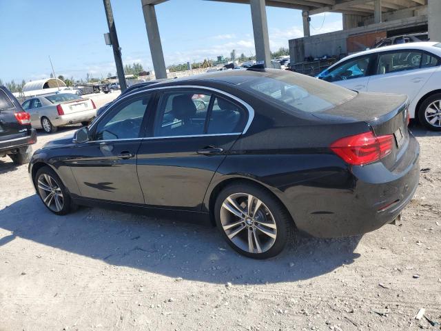 WBA8B9G5XHNU48924 - 2017 BMW 330 I BLACK photo 2