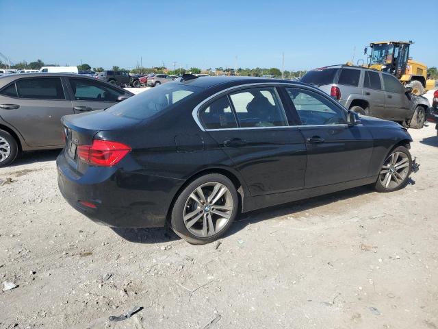 WBA8B9G5XHNU48924 - 2017 BMW 330 I BLACK photo 3