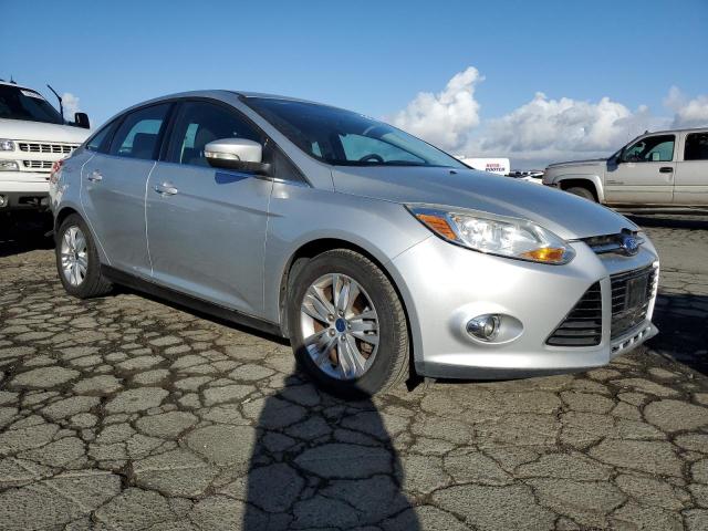 1FAHP3H26CL416889 - 2012 FORD FOCUS SEL SILVER photo 4