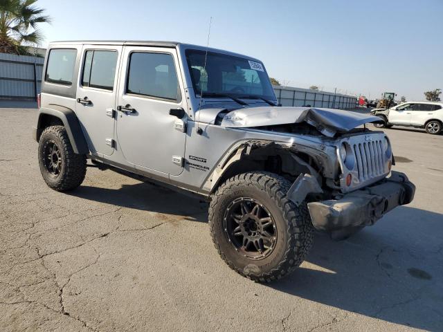 1C4BJWDGXDL615871 - 2013 JEEP WRANGLER U SPORT GRAY photo 4