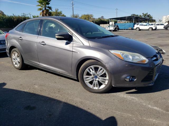 1FAHP3H29CL367235 - 2012 FORD FOCUS SEL GRAY photo 4