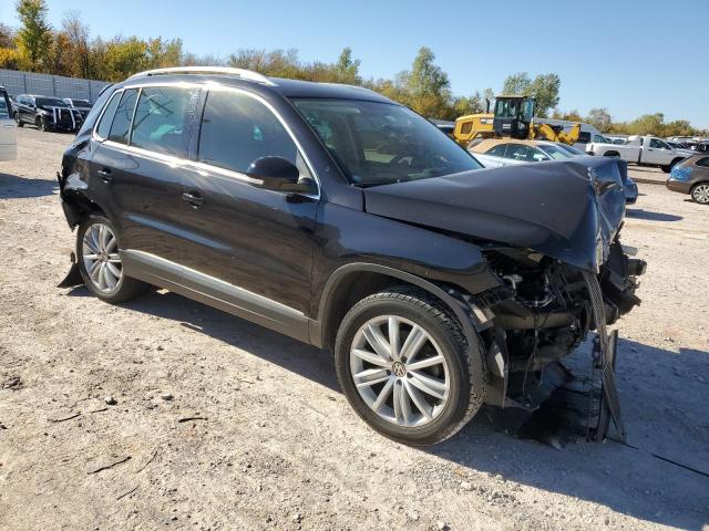 WVGAV3AX3EW552577 - 2014 VOLKSWAGEN TIGUAN S BLACK photo 4