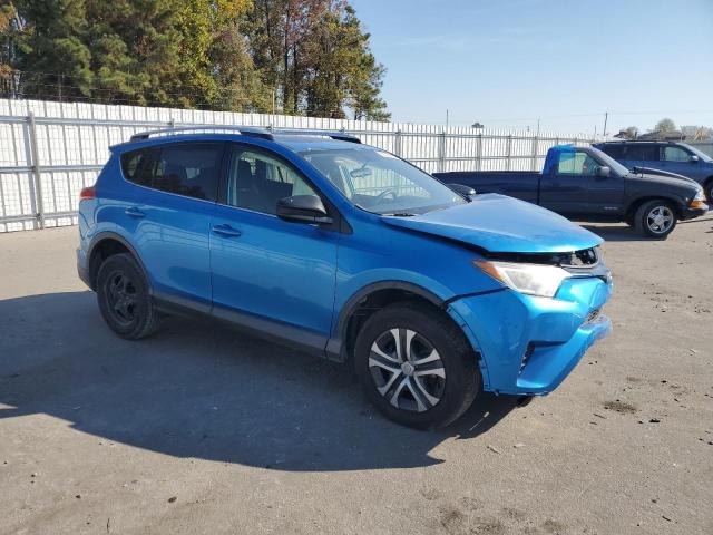 JTMZFREVXGJ067580 - 2016 TOYOTA RAV4 LE BLUE photo 4