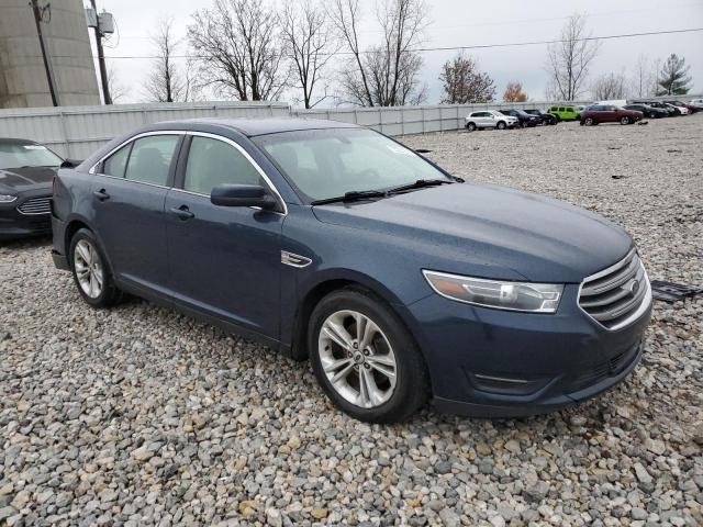 1FAHP2E90GG112127 - 2016 FORD TAURUS SEL BLUE photo 4