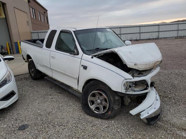 1FTRX18WXXKB75470 - 1999 FORD F150 WHITE photo 4