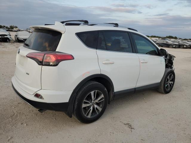 JTMWFREV2GJ096784 - 2016 TOYOTA RAV4 XLE WHITE photo 3