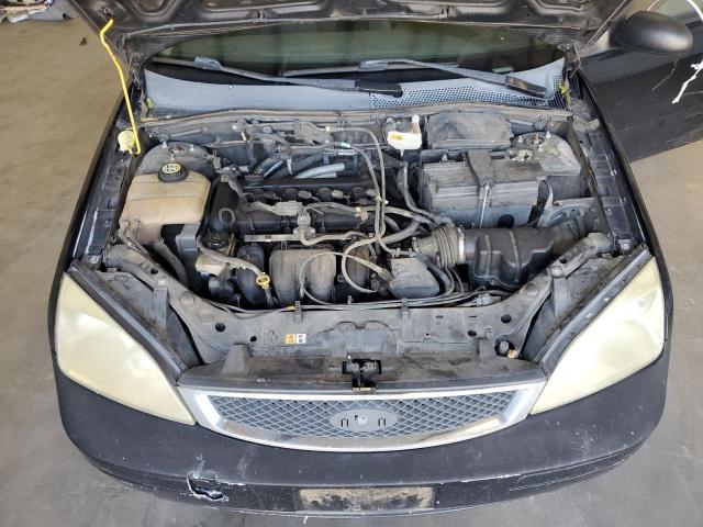 1FAFP34N77W297469 - 2007 FORD FOCUS ZX4 BLACK photo 11