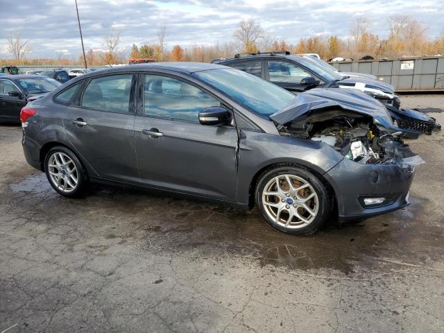 1FADP3F24FL323181 - 2015 FORD FOCUS SE GRAY photo 4