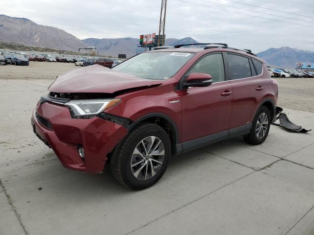 JTMRJREV4JD223701 - 2018 TOYOTA RAV4 HV LE MAROON photo 1