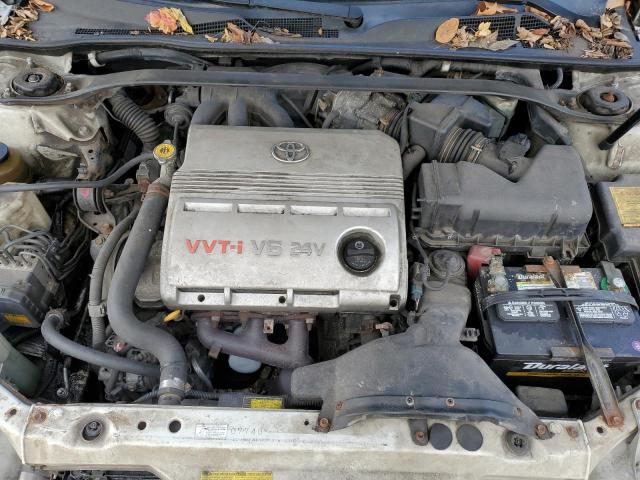 4T1BF30K74U067005 - 2004 TOYOTA CAMRY LE WHITE photo 11