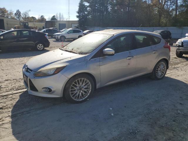 1FADP3N29EL125874 - 2014 FORD FOCUS TITANIUM SILVER photo 1