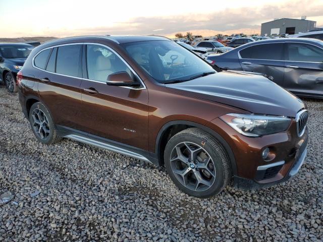 WBXHT3C30GP881496 - 2016 BMW X1 XDRIVE28I ORANGE photo 4