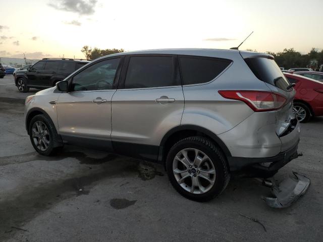 1FMCU9H92DUB99670 - 2013 FORD ESCAPE SEL SILVER photo 2