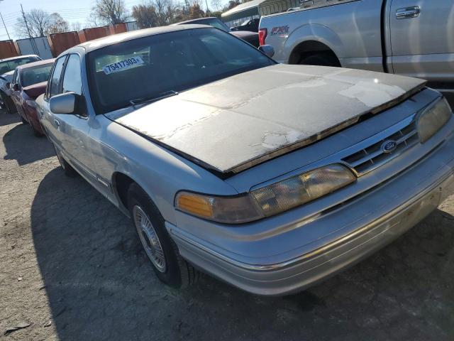 2FALP73W3VX175682 - 1997 FORD CROWN VICT GRAY photo 4