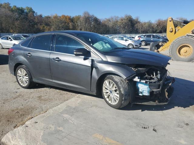 1FADP3J23GL324573 - 2016 FORD FOCUS TITANIUM GRAY photo 4