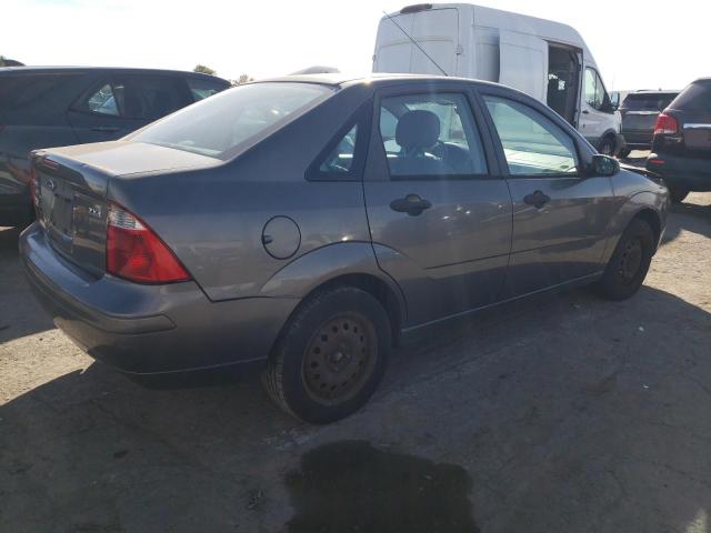 1FAFP34N05W152318 - 2005 FORD FOCUS ZX4 GRAY photo 3