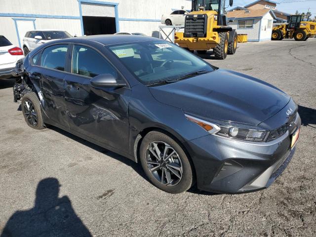 3KPF24AD7PE585769 - 2023 KIA FORTE LX GRAY photo 4